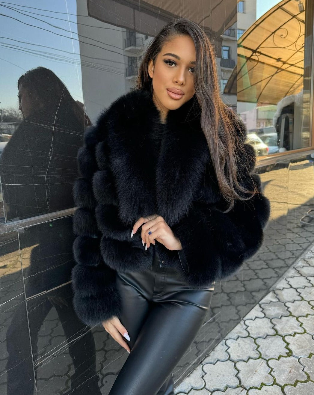 Chic model showcasing the Giselle black fox fur jacket