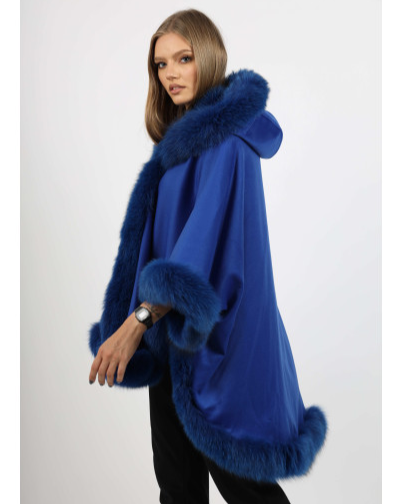 Side view of the Ophelia blue fox fur hooded cape, highlighting the elegant drape and rich color.