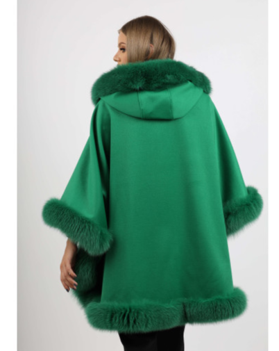 Back view of the Ophelia green fox fur hooded cape, displaying the hood's exquisite design and fur trim.