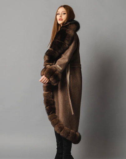 Side profile of the Zaira alpaca wool coat, showcasing the natural drape and fox fur trim.