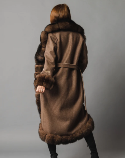 Rear view of the Zaira coat, highlighting the luxurious fox fur and the rich texture of alpaca wool.